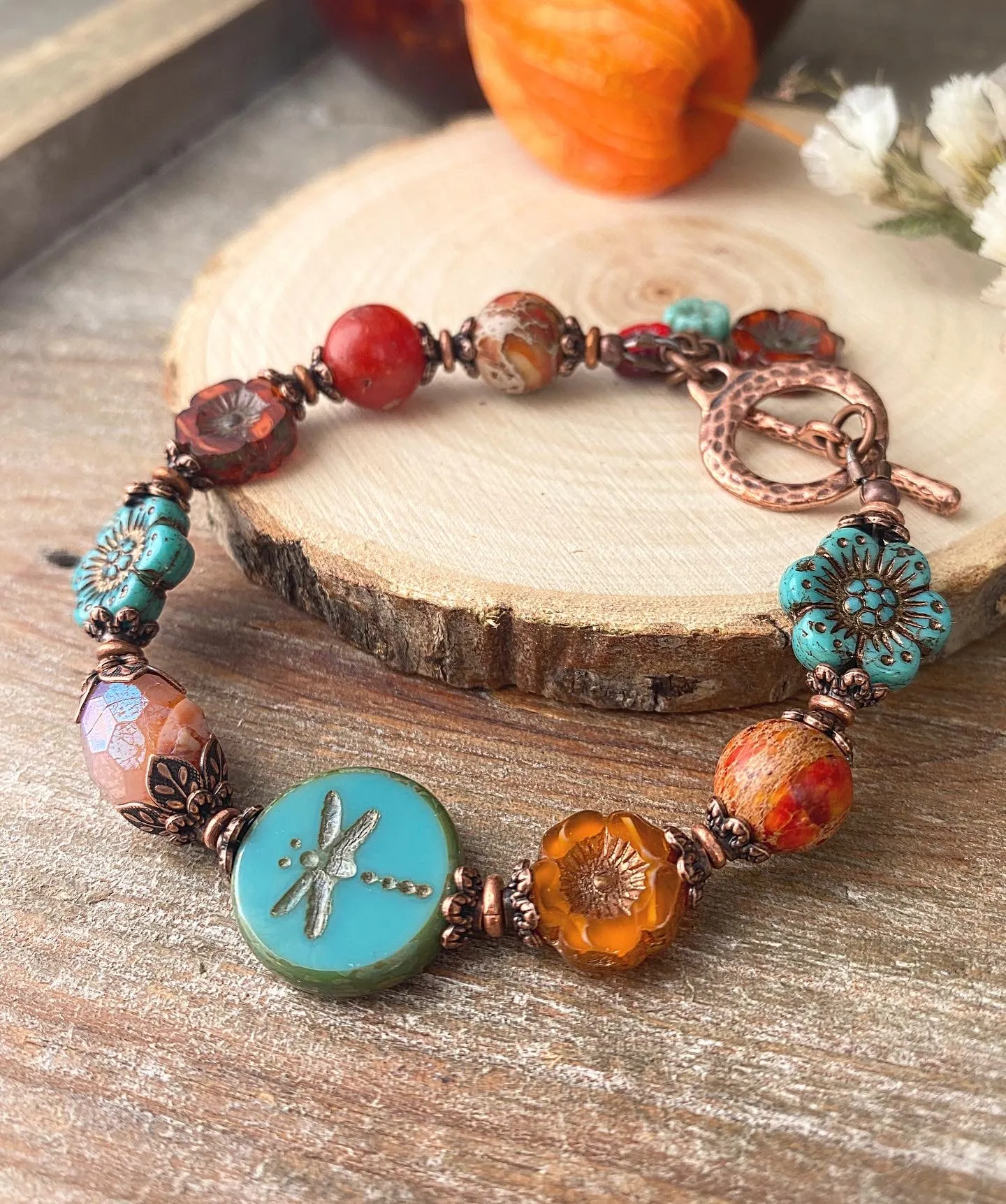 Flower Czech glass in turquoise, orange jasper, agate, copper metal bracelet.