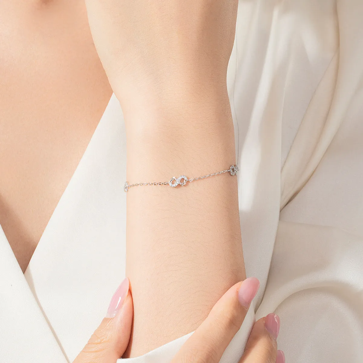 Infinite Love Sterling Silver Bracelet with Zircon Gems by Planderful