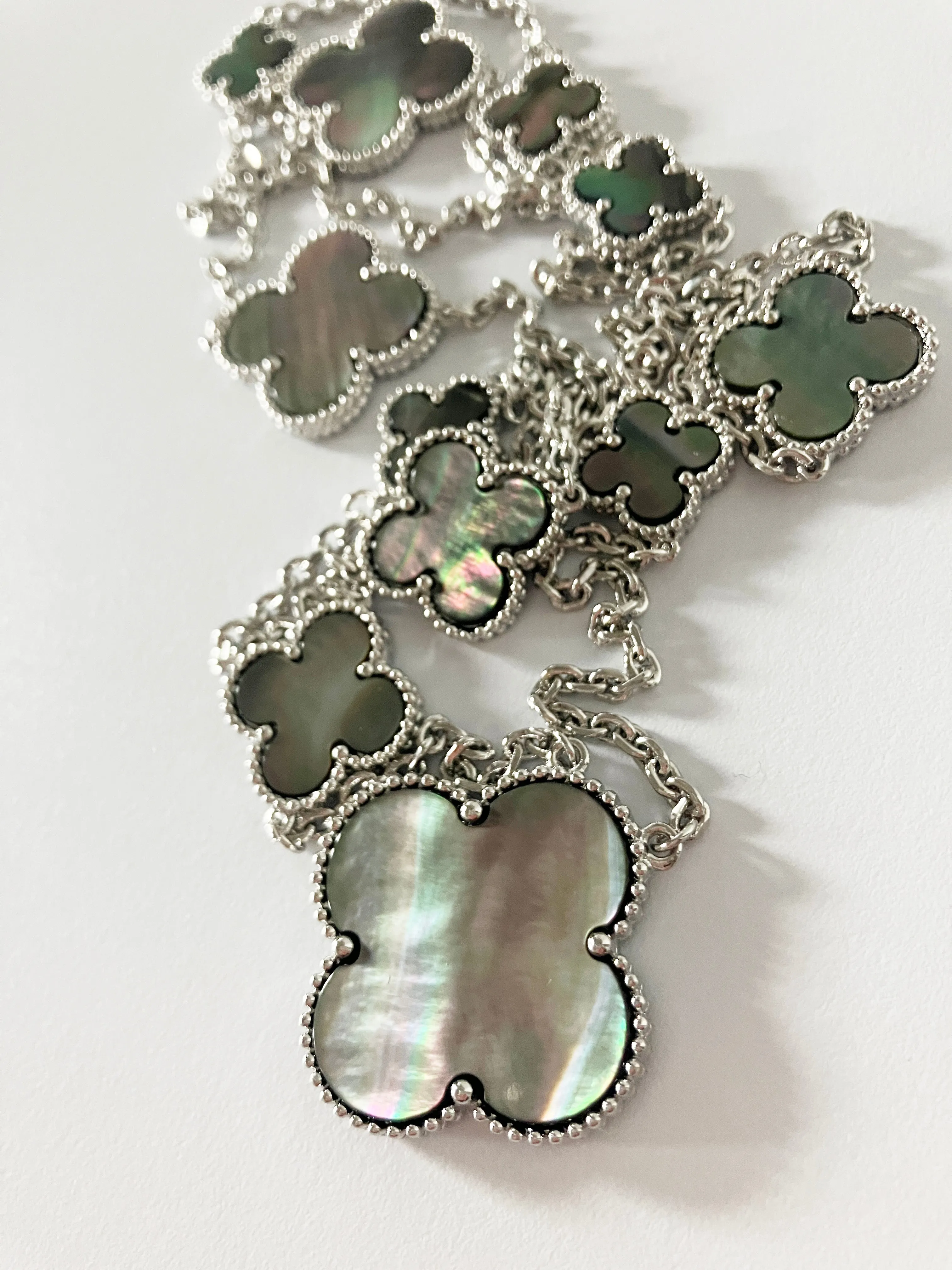 Mixed Size Gray Mother of Pearl Quatrefoil Silver Plated Pendant