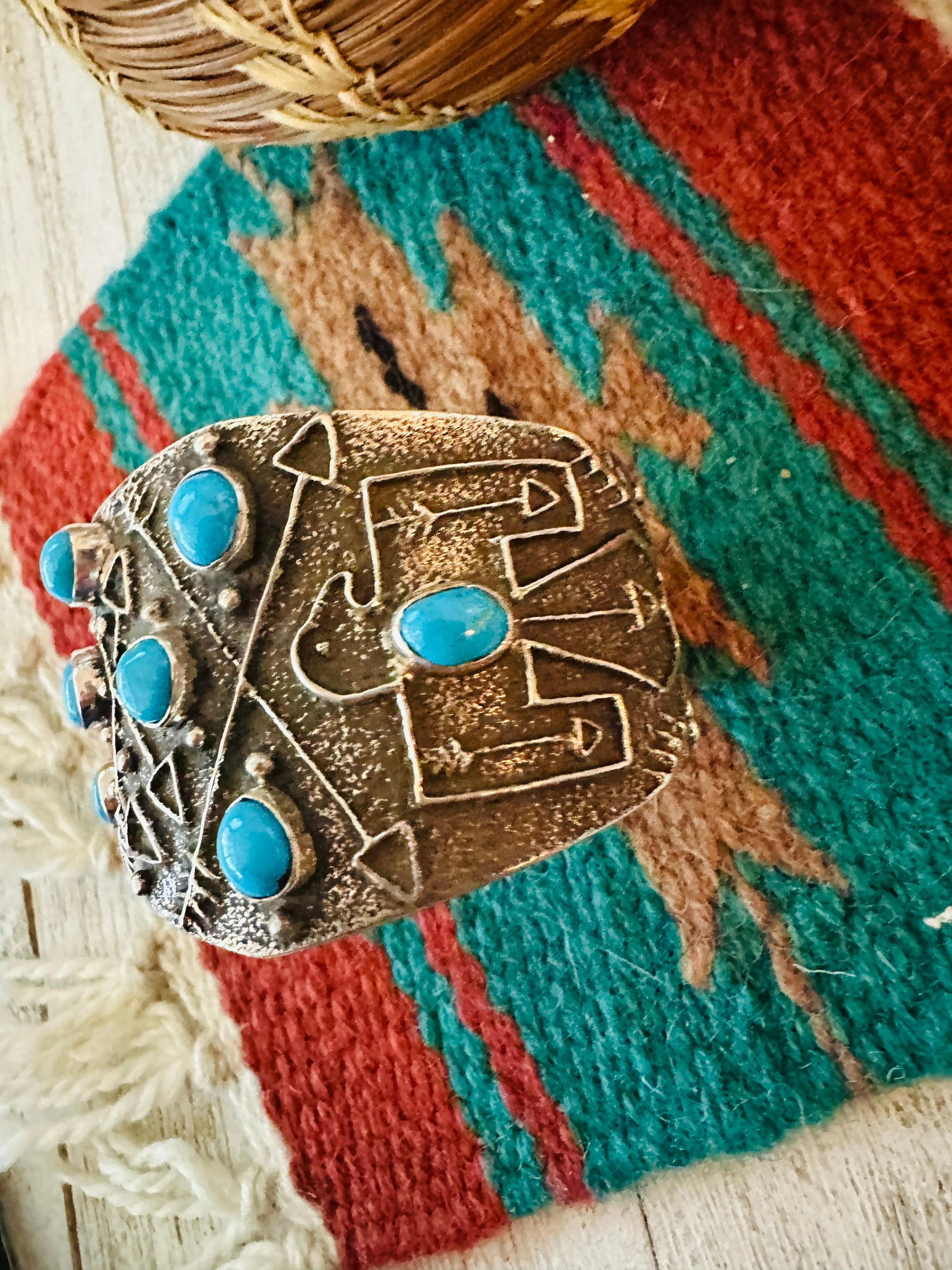 Navajo Turquoise & Sterling Silver Thunderbird Tufa Cast Cuff Bracelet by Delbert Arviso