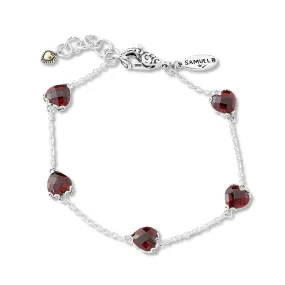 Sterling Silver 7mm Heart Garnet Station Bracelet 7in 1in ext.