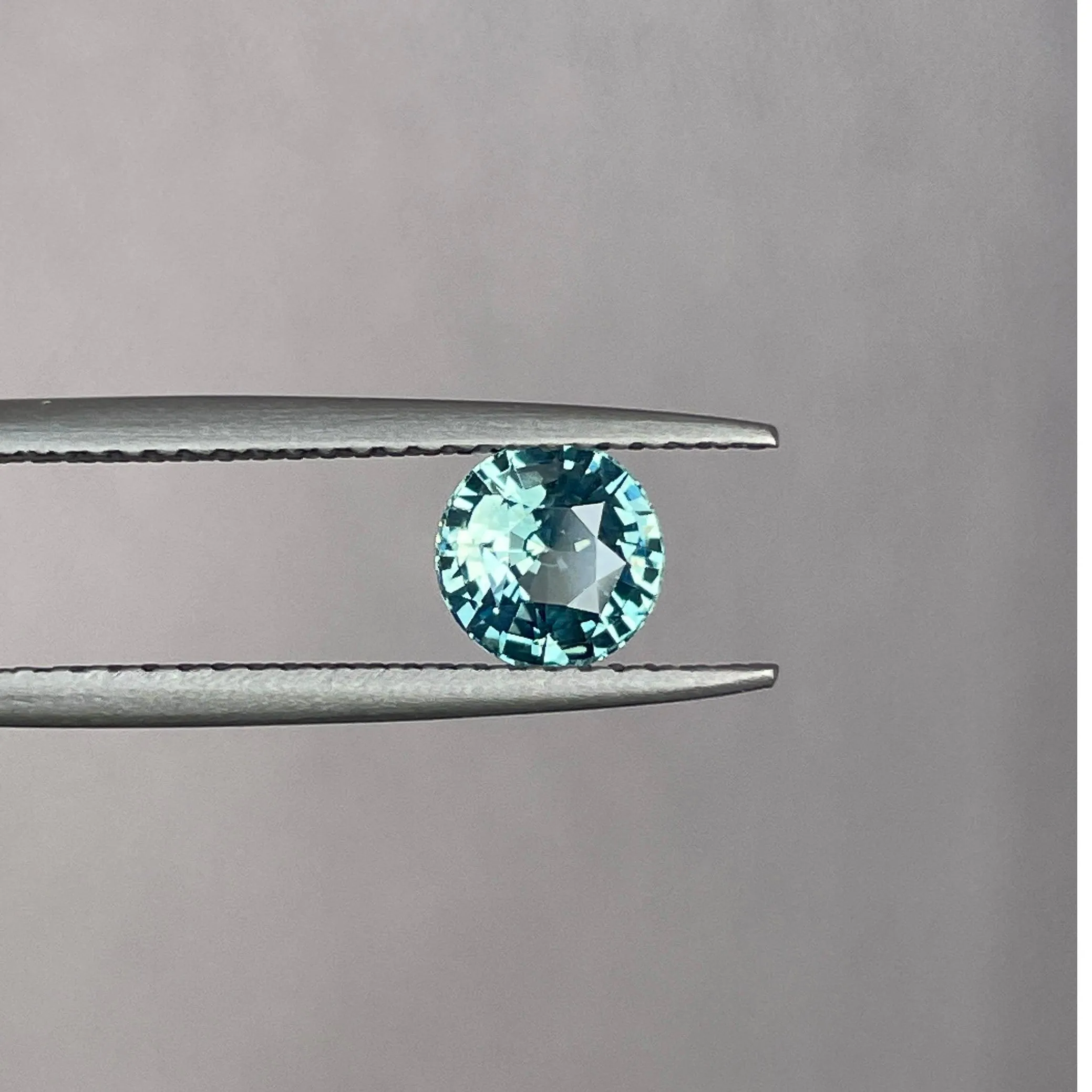 This 0.96 crt Teal Sapphire is well cut to bring out the best colour and lustre, and has a perfect colour blend.