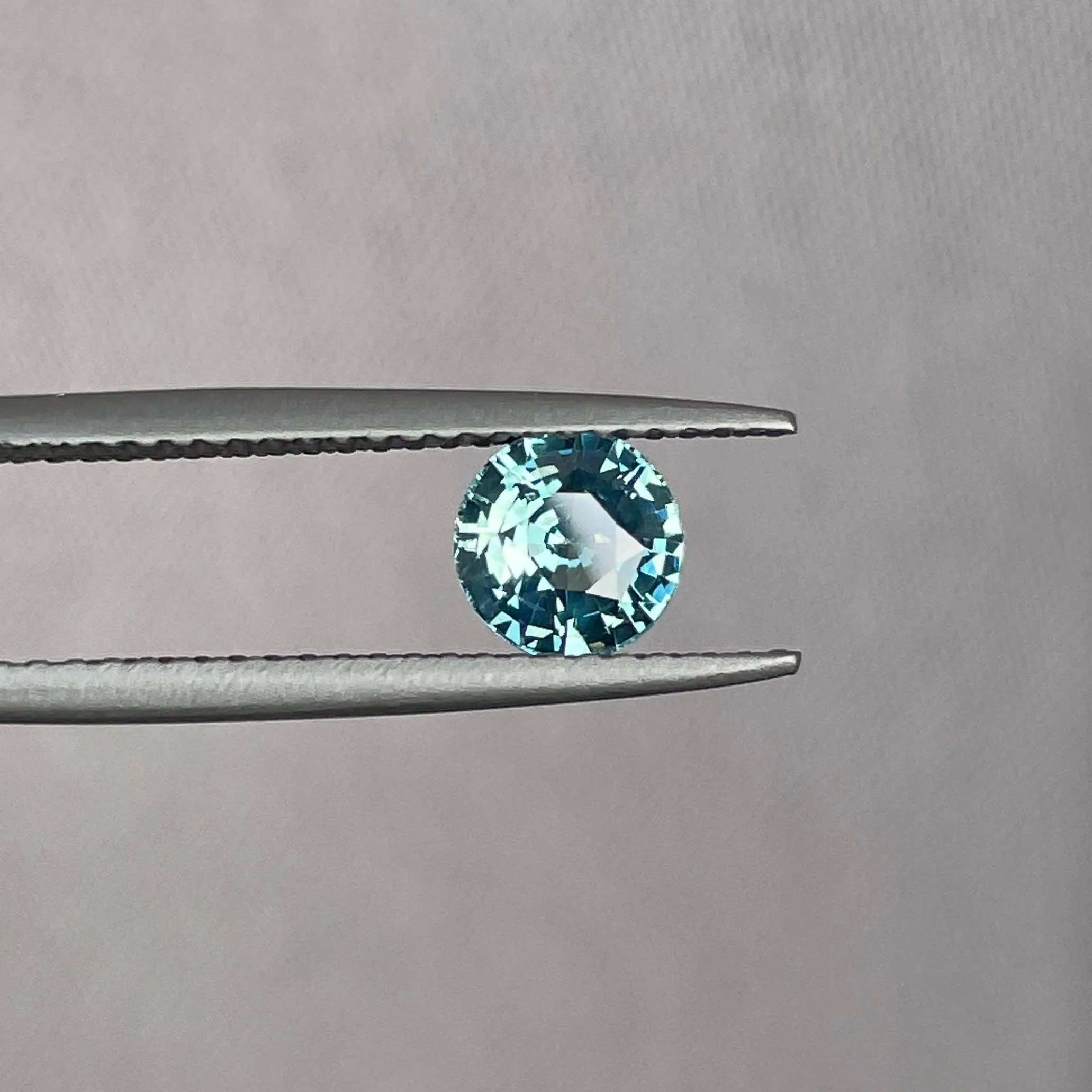 This 0.96 crt Teal Sapphire is well cut to bring out the best colour and lustre, and has a perfect colour blend.