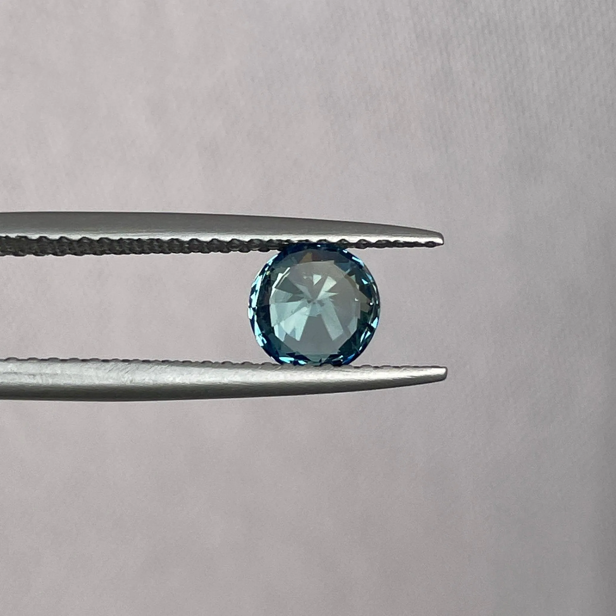 This 0.96 crt Teal Sapphire is well cut to bring out the best colour and lustre, and has a perfect colour blend.