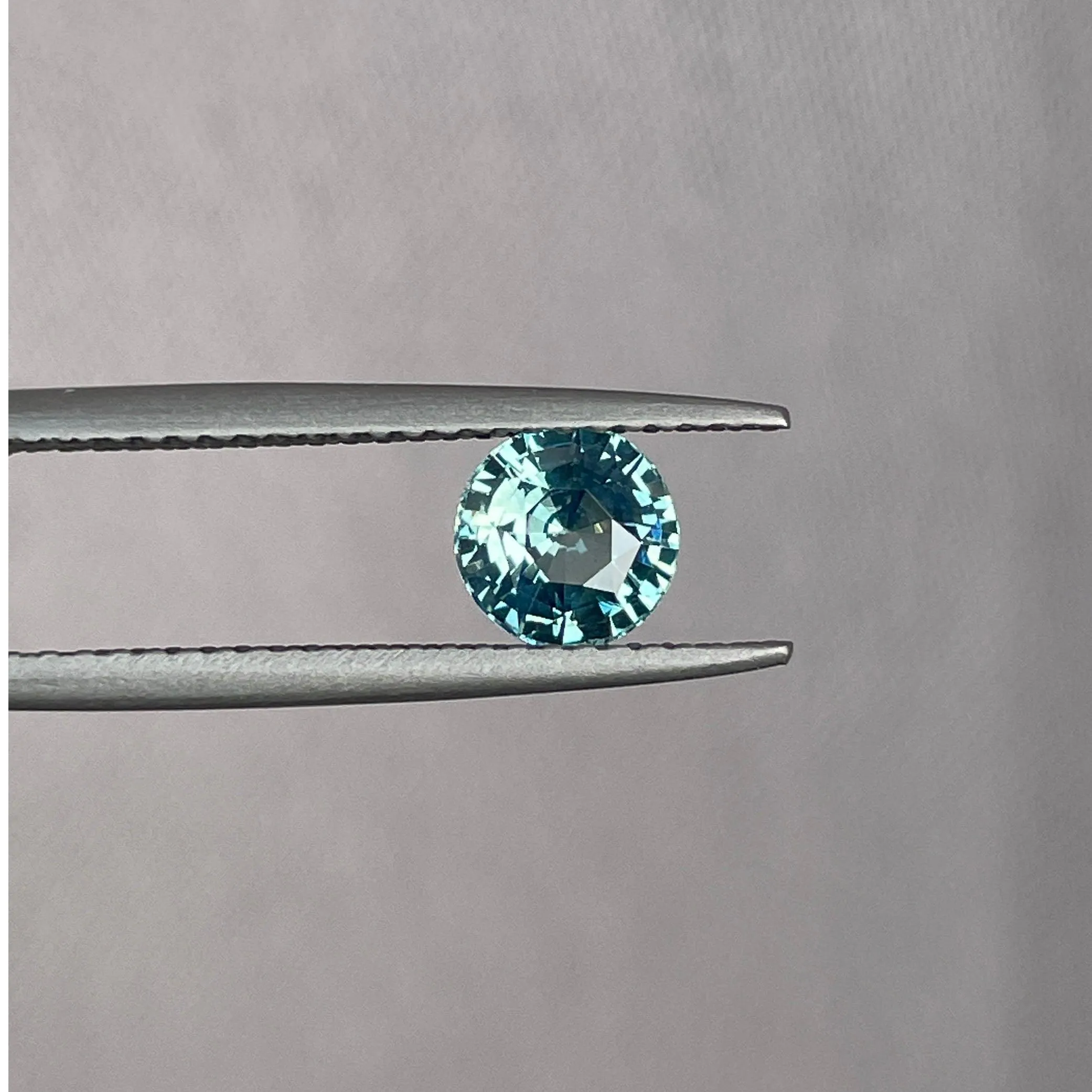 This 0.96 crt Teal Sapphire is well cut to bring out the best colour and lustre, and has a perfect colour blend.