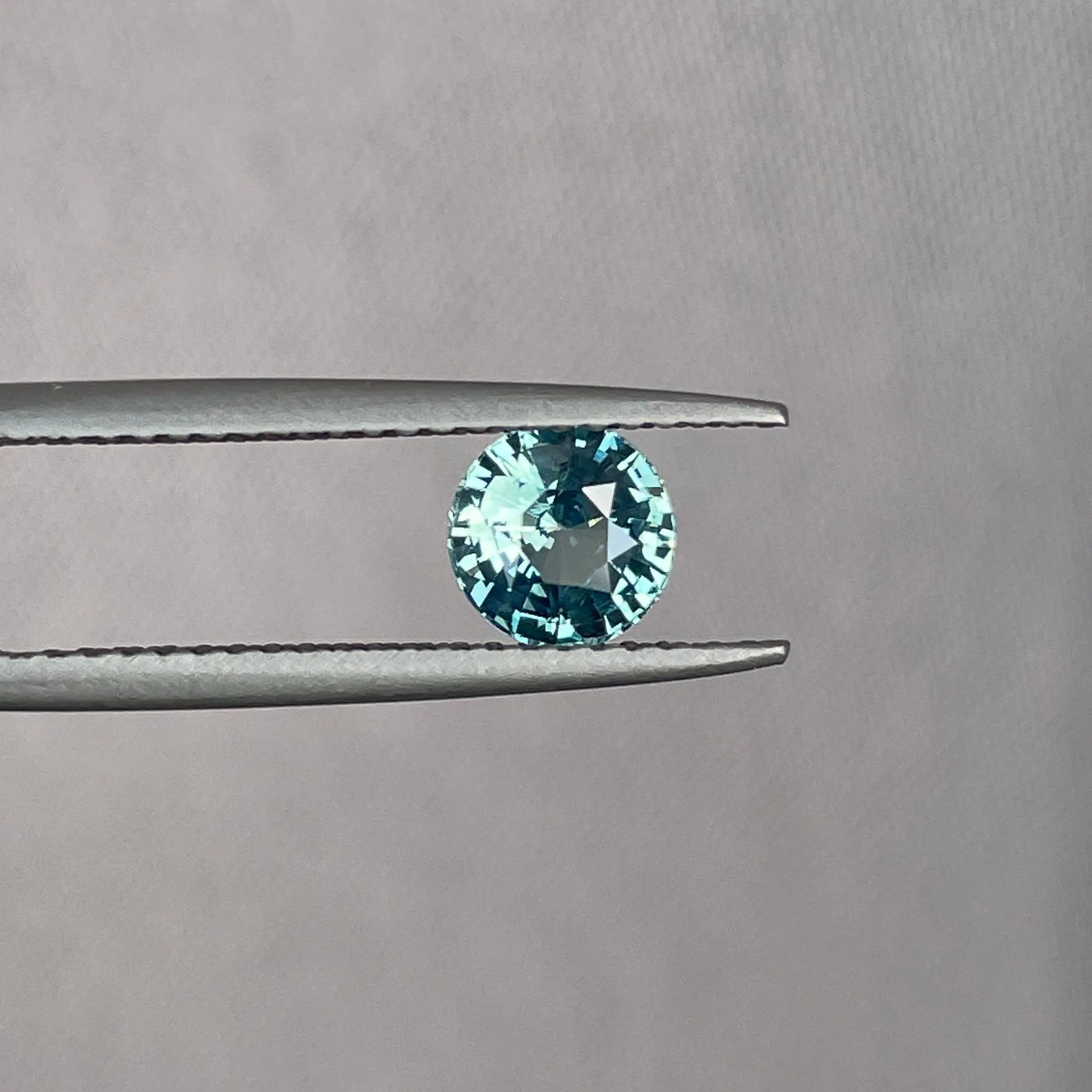 This 0.96 crt Teal Sapphire is well cut to bring out the best colour and lustre, and has a perfect colour blend.