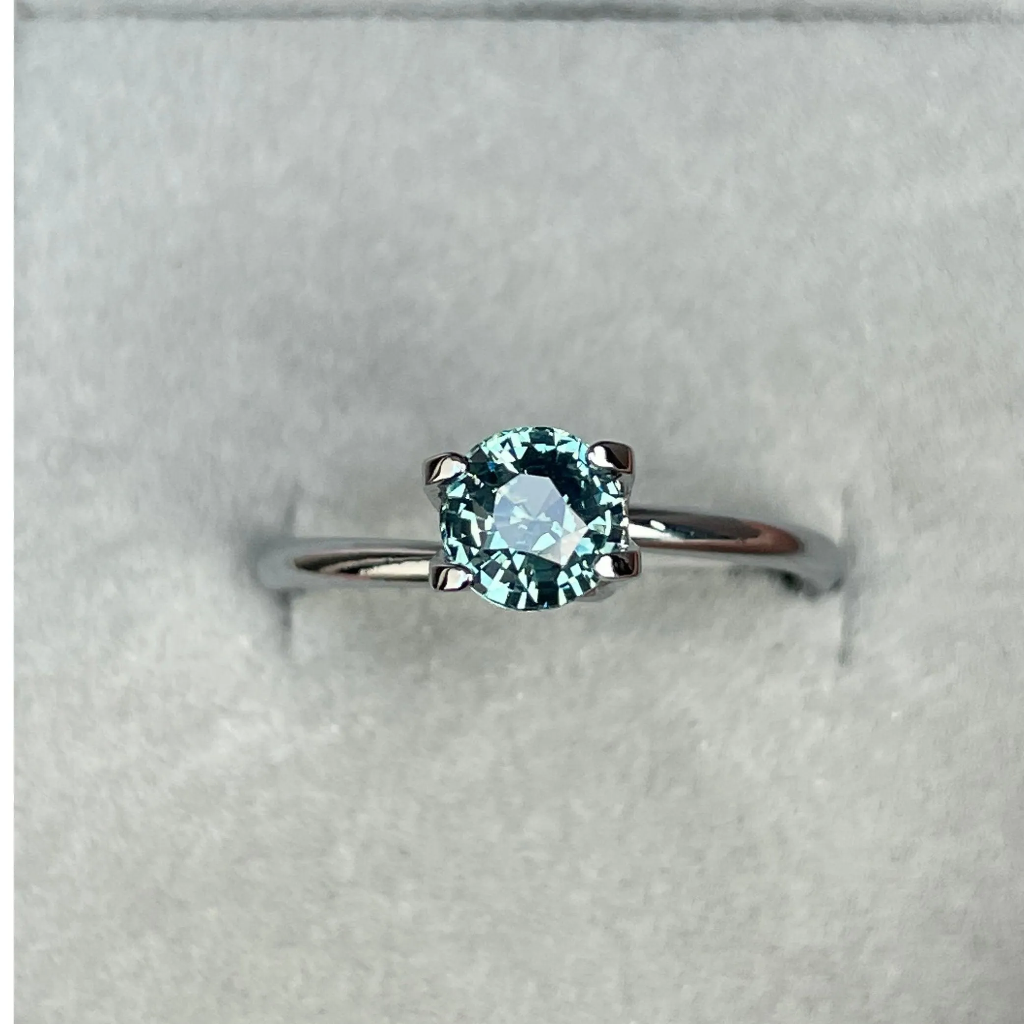 This 0.96 crt Teal Sapphire is well cut to bring out the best colour and lustre, and has a perfect colour blend.